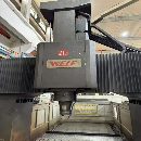 威立425龙门，工作台2.4米4米，门宽2.7米，门高1.7米.