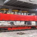 工厂在位出售：安装未用，2300吨框架液压机，带移动工.