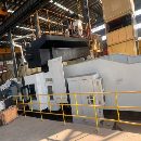 纽威PM3060HZ。工作台3X6米，门宽3.8米，门高1.6米。.